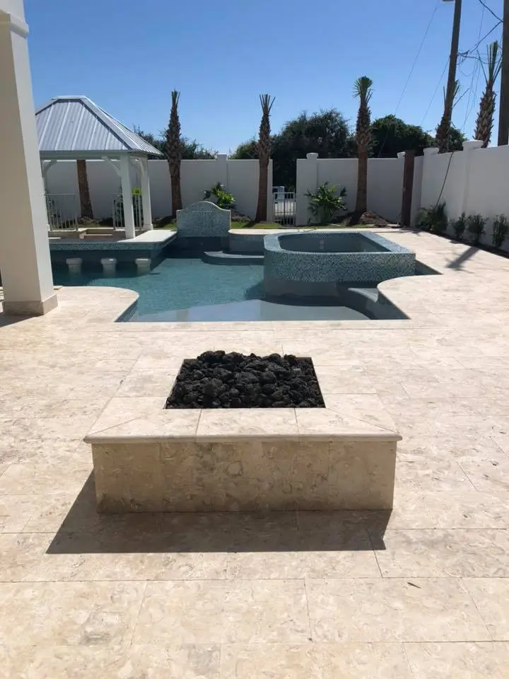 Fire pit in front of pool